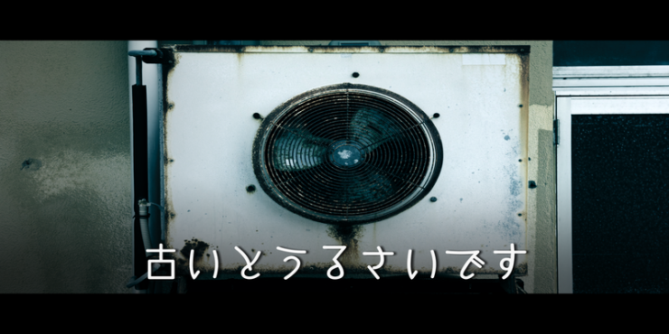 古いエアコンの室外機の画像